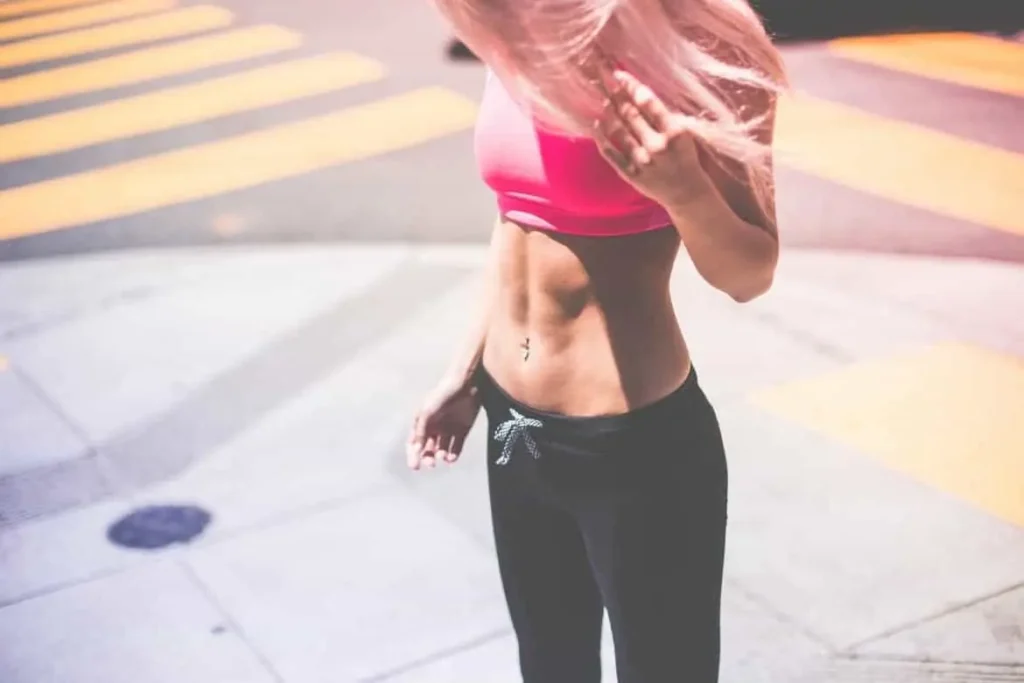 Woman with toned stomach after LA-EMS Body Sculpting Treatment Haverhill